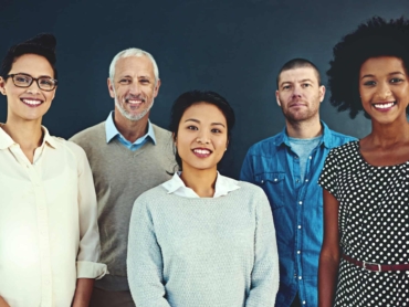 Portrait of a diverse team of creative colleagues posing in the studio.