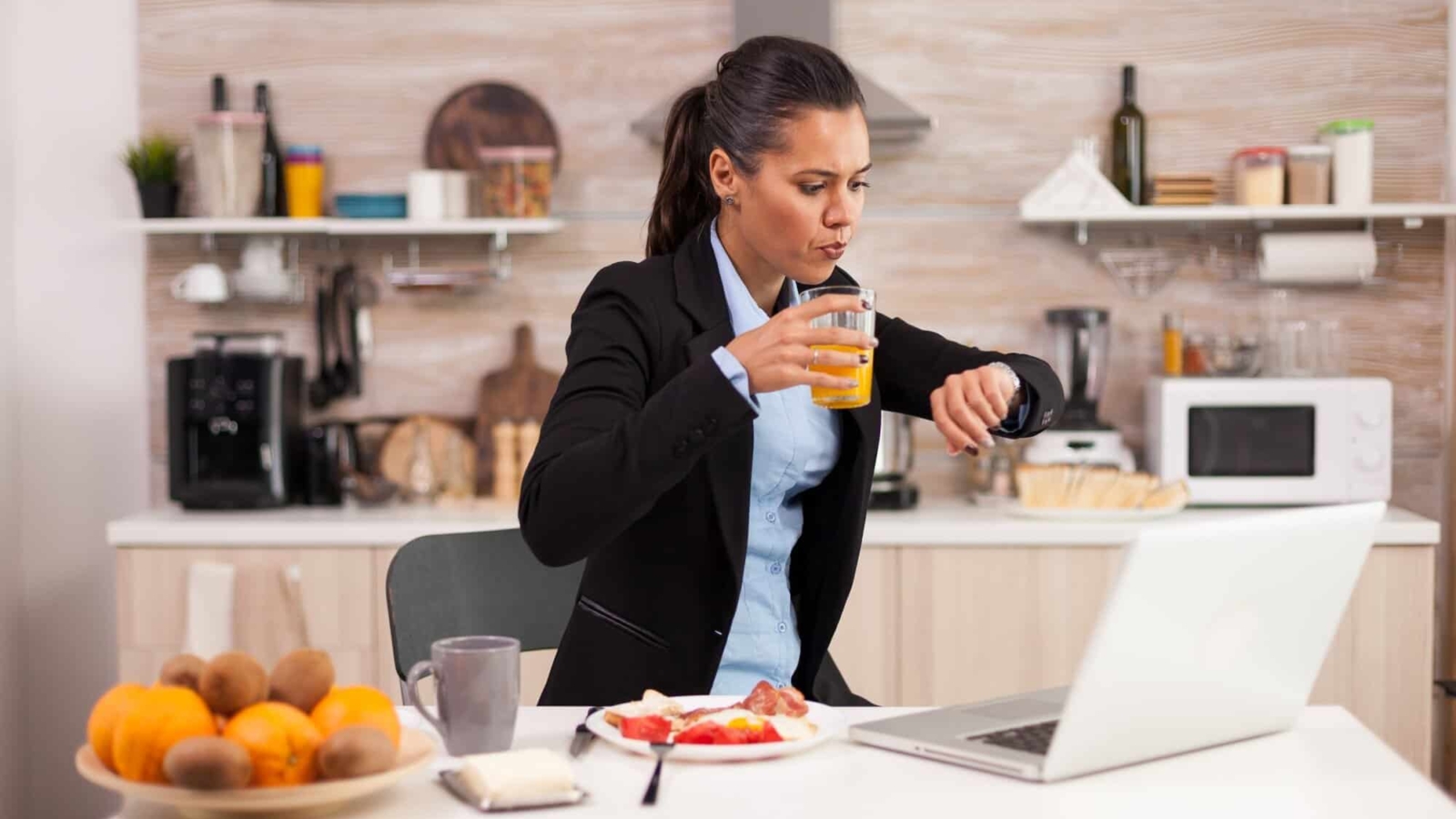 Business woman late at conference
