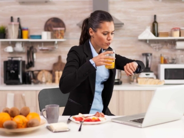 Business woman late at conference