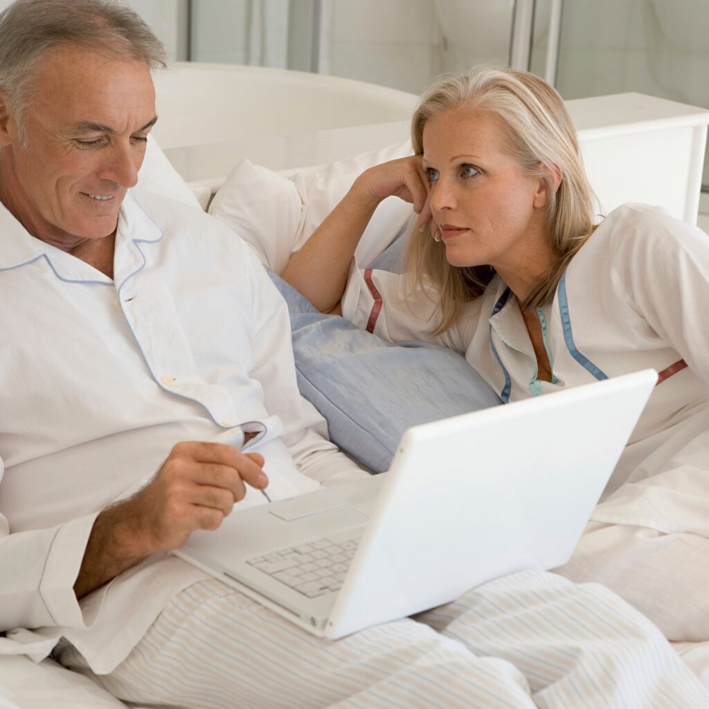 Mature couple with laptop
